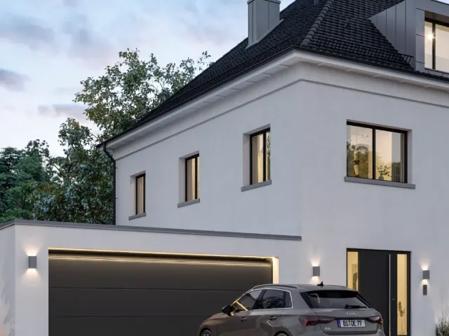 Weißes Einfamilienhaus mit dunklem Garagentor und davor geparktem Auto